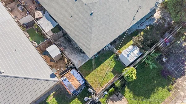 a bird view of a house with a garden