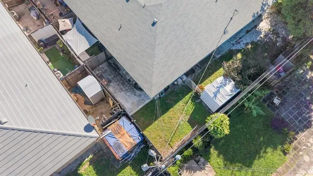 a bird view of a house with a garden