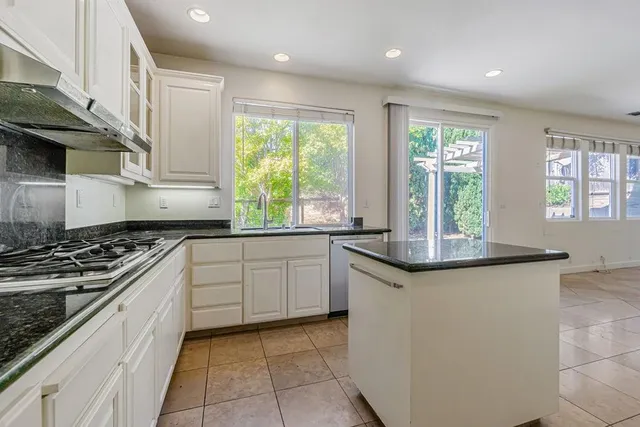 a front view of a house with a garage