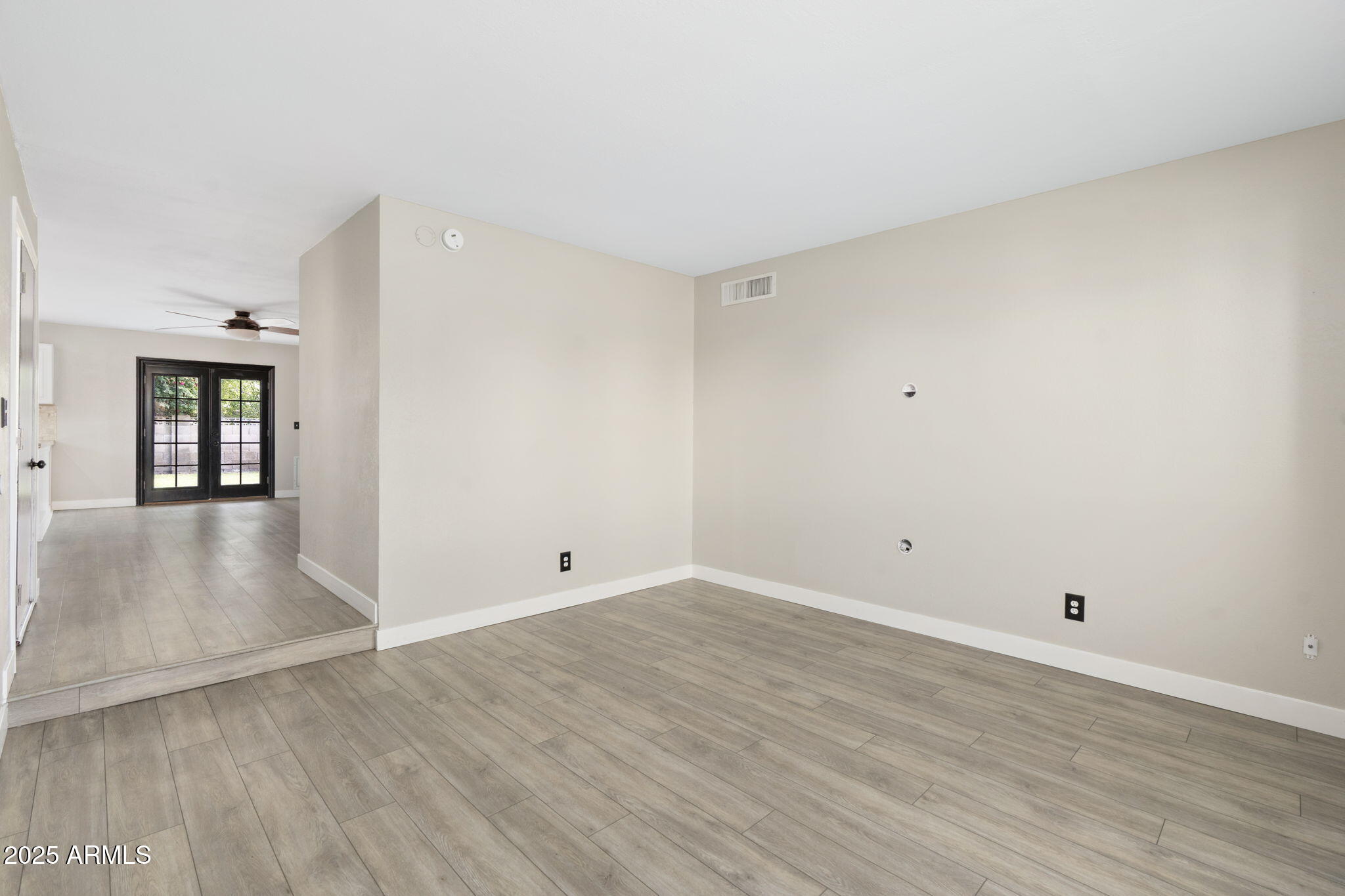 17 South Cholla Street Gilbert, AZ 85233 - Photo 17 of 37 wooden floor in an empty room