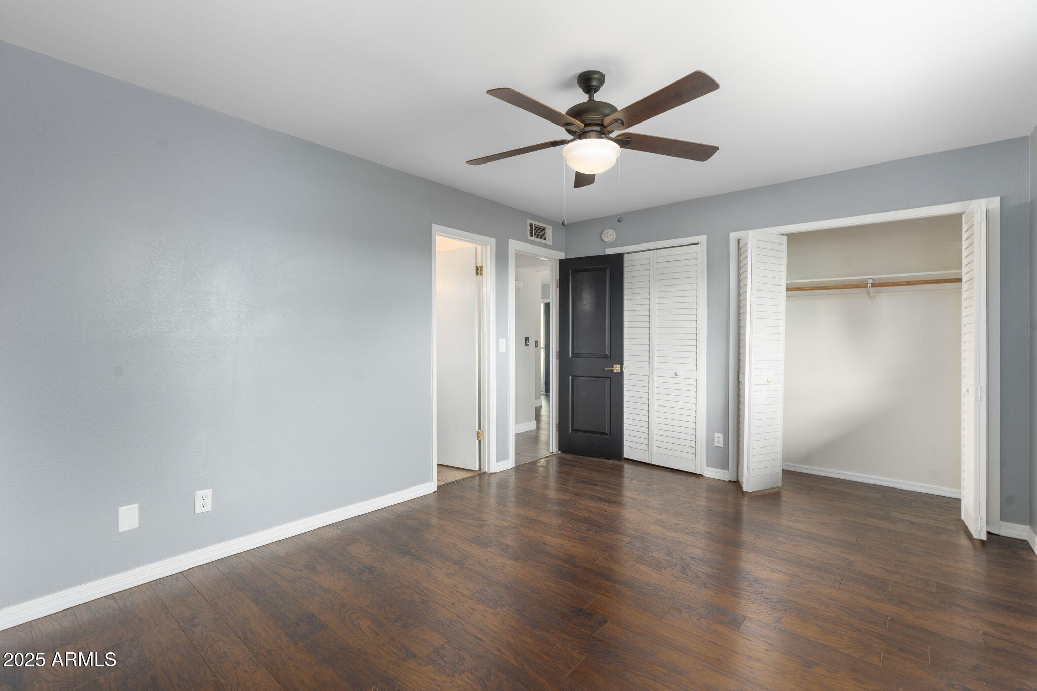17 South Cholla Street Gilbert, AZ 85233 - Photo 23 of 37 a view of a big room with wooden floor and windows