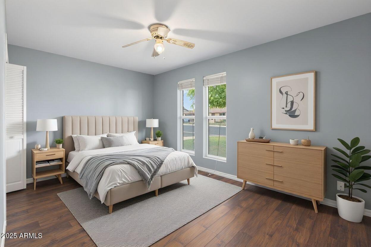 17 South Cholla Street Gilbert, AZ 85233 - Photo 25 of 37 a bedroom with a bed and a chandelier