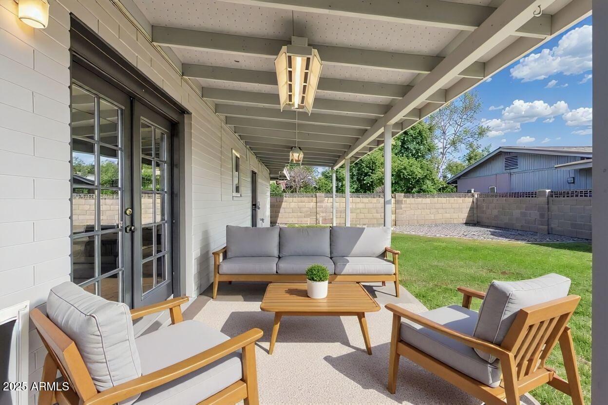 17 South Cholla Street Gilbert, AZ 85233 - Photo 29 of 37 a outdoor living space with furniture and garden view