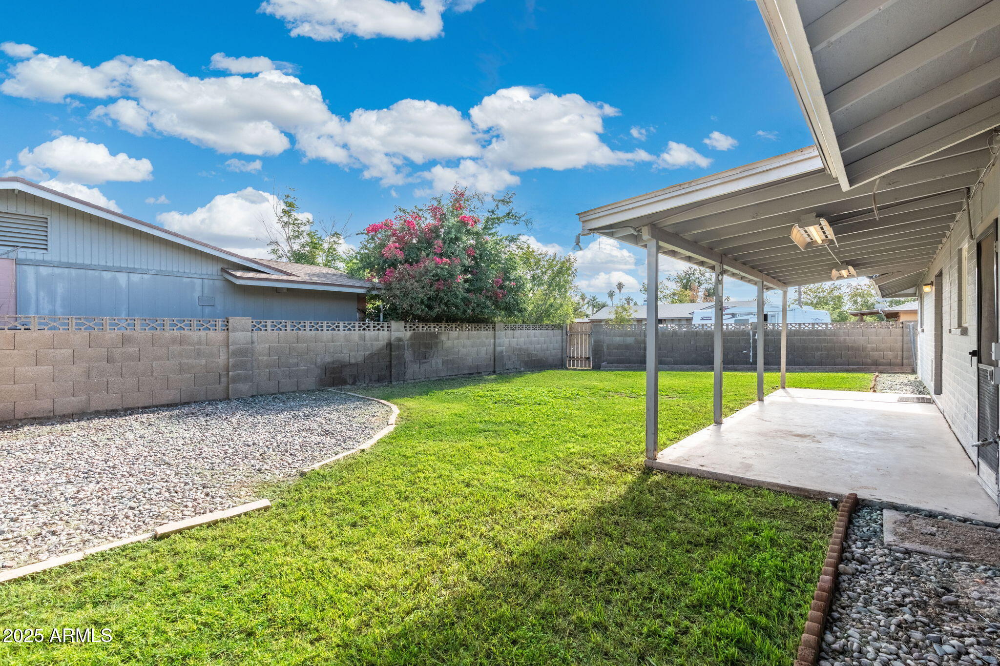 17 South Cholla Street Gilbert, AZ 85233 - Photo 32 of 37 a view of a backyard with garden