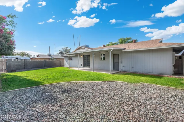 a house view with a garden space