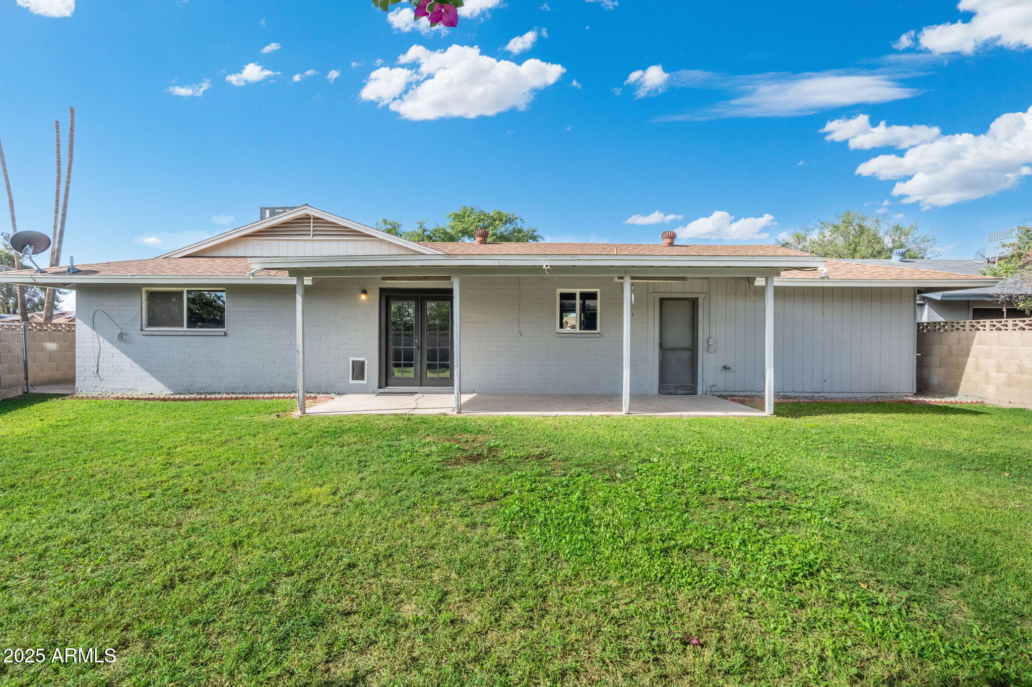 17 South Cholla Street Gilbert, AZ 85233 - Photo 35 of 37 a front view of house with yard and outdoor seating