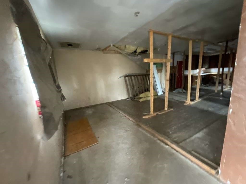 315 West Grand Street Borger, TX 79007 - Photo 7 of 19 an empty room with wooden floor