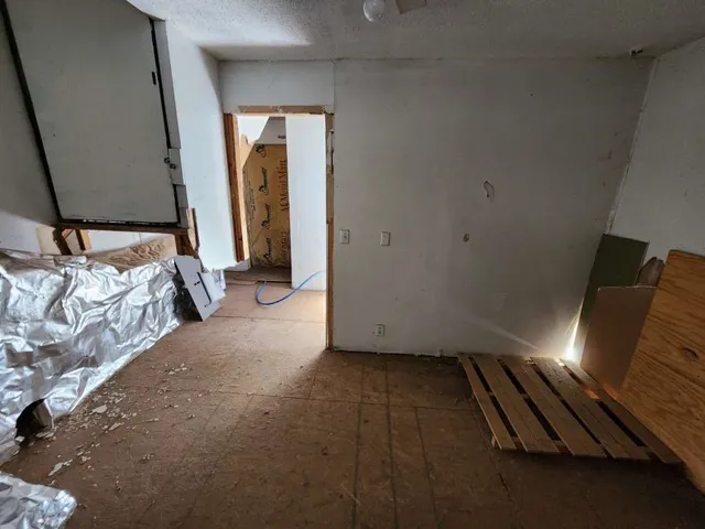 a view of a livingroom with furniture