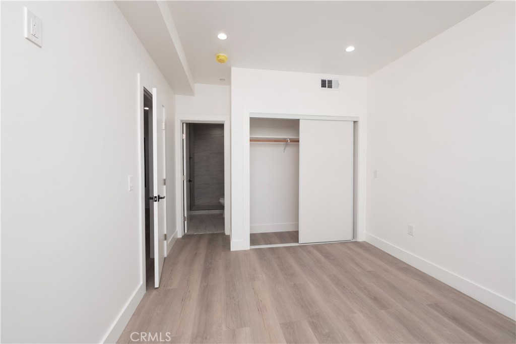 1571 Ricardo Street Los Angeles, CA 90033 - Photo 23 of 29 a view of hallway with wooden floor