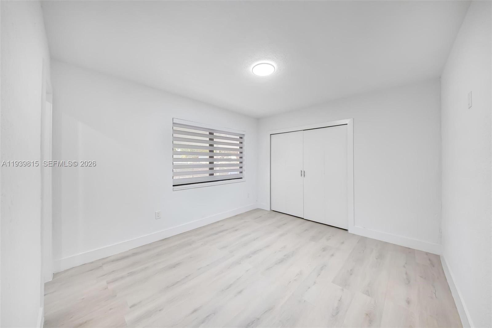 2250 Northwest 95th Street Miami, FL 33147 - Photo 17 of 26 an empty room with windows