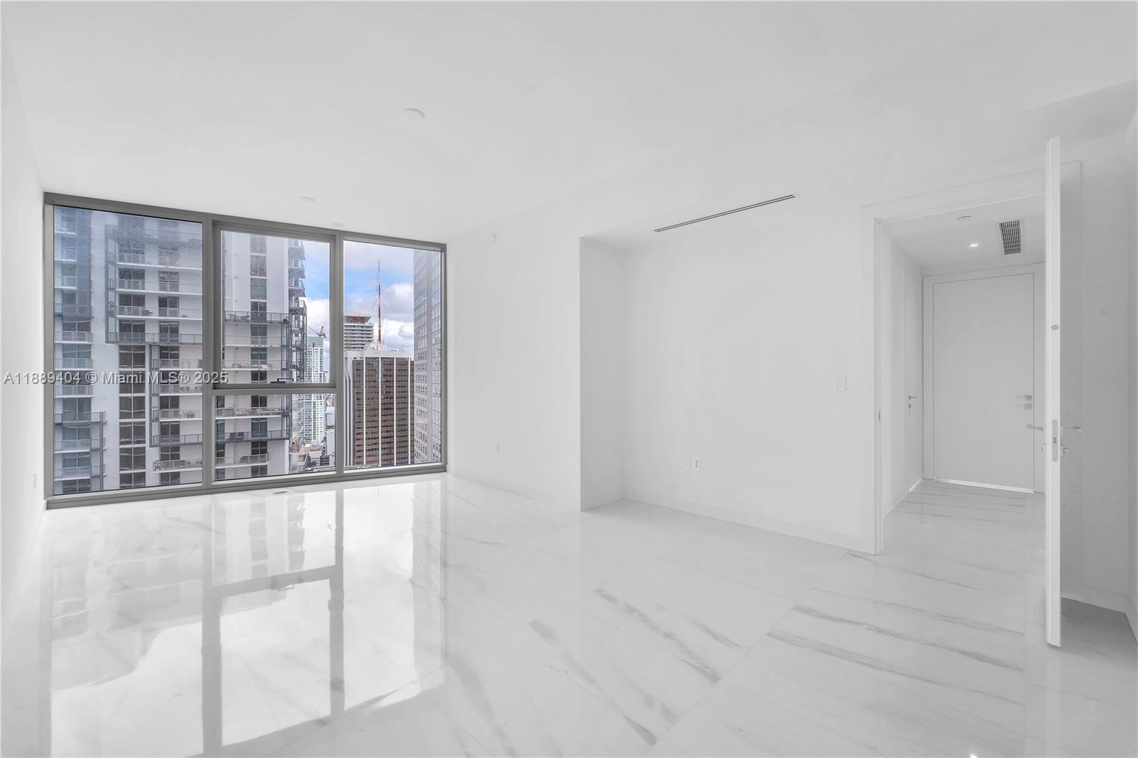 300 Biscayne Blvd Way, Unit 3602E Miami, FL 33131 - Photo 12 of 19 a view of an empty room with a window