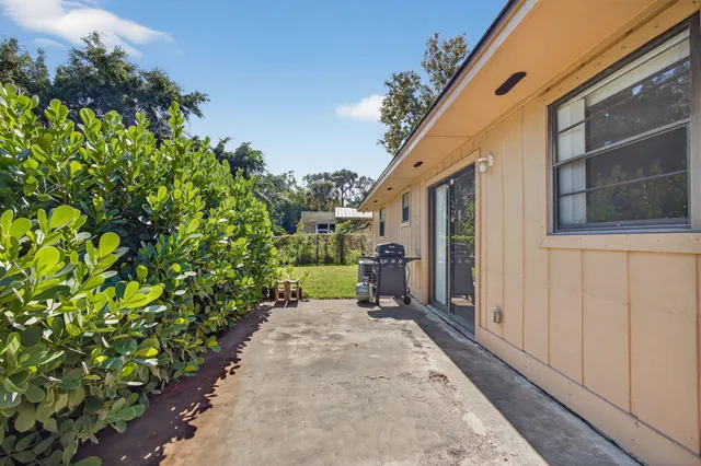 a view of a back yard of the house