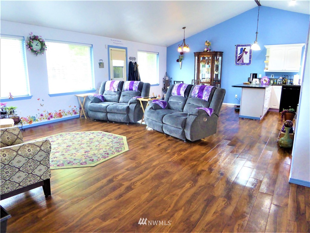 8637 194th Avenue Southwest Rochester, WA 98579 - Photo 11 of 37 a living room with furniture and a couch