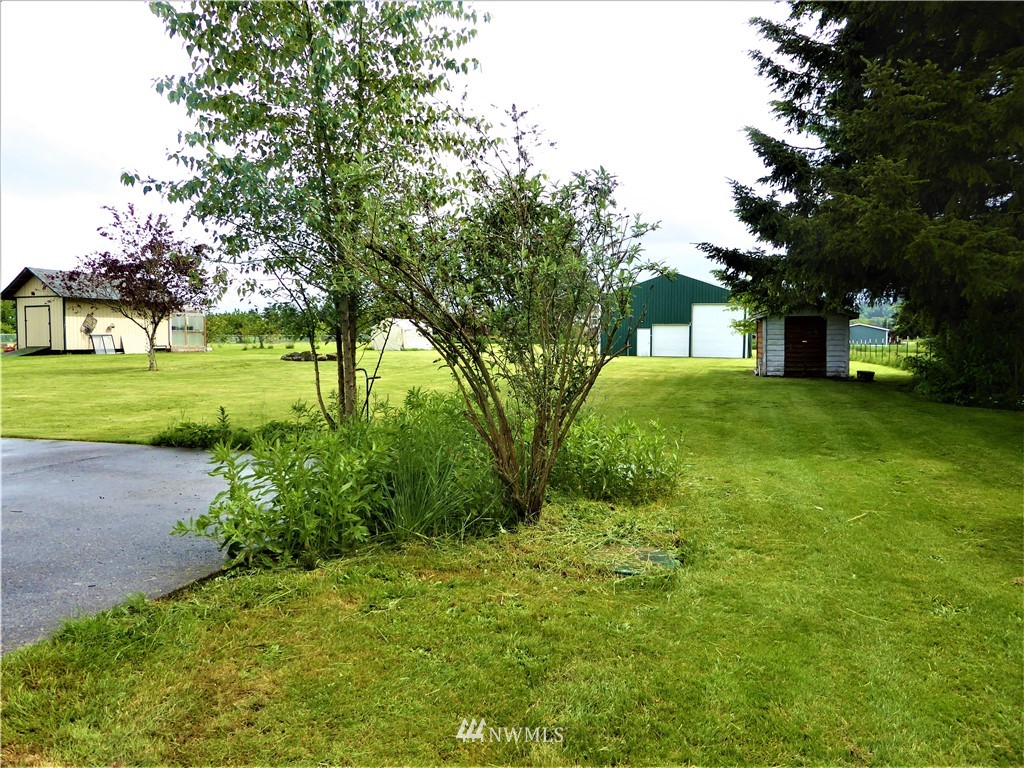 8637 194th Avenue Southwest Rochester, WA 98579 - Photo 36 of 37 a view of a house with a yard