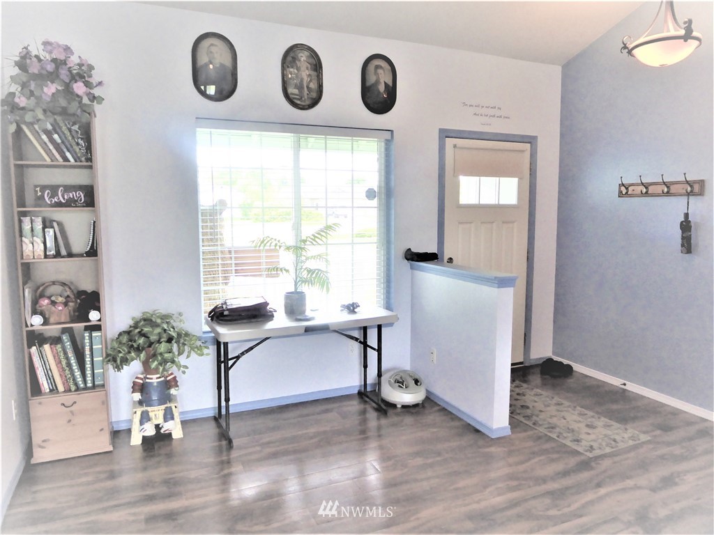 8637 194th Avenue Southwest Rochester, WA 98579 - Photo 6 of 37 an entryway with a window and a rug