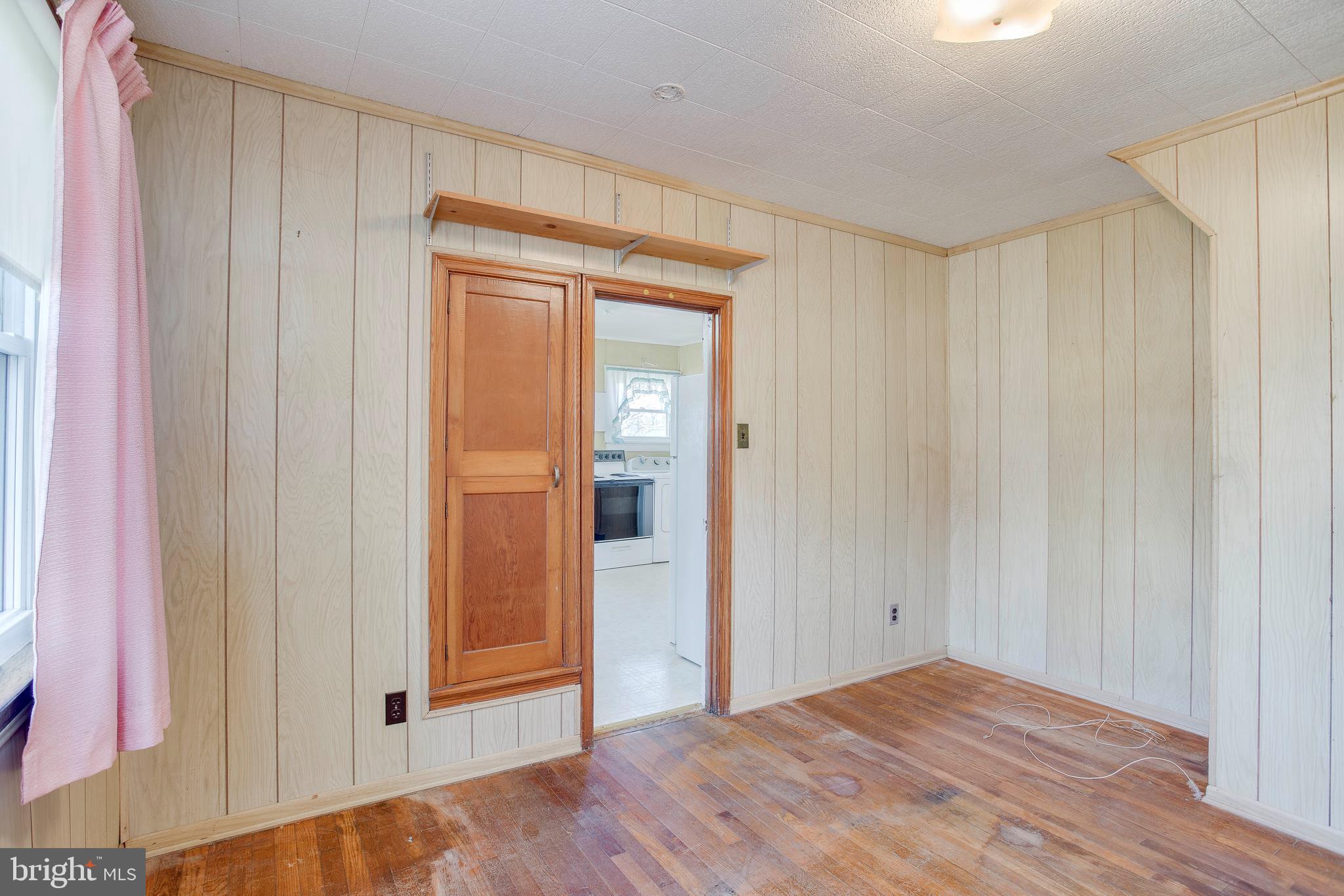 1716 Hilyard Road Baltimore, MD 21234 - Photo 29 of 33 Large Second Bedroom with Hardwood Floors