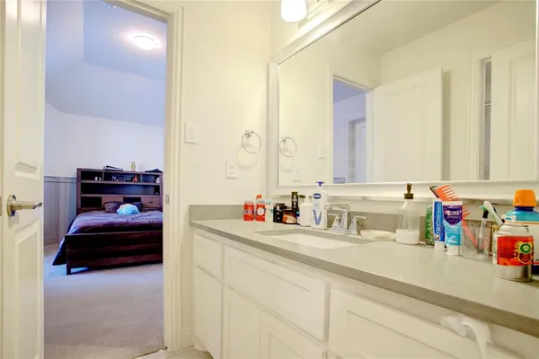 a bathroom with a sink and a bathtub
