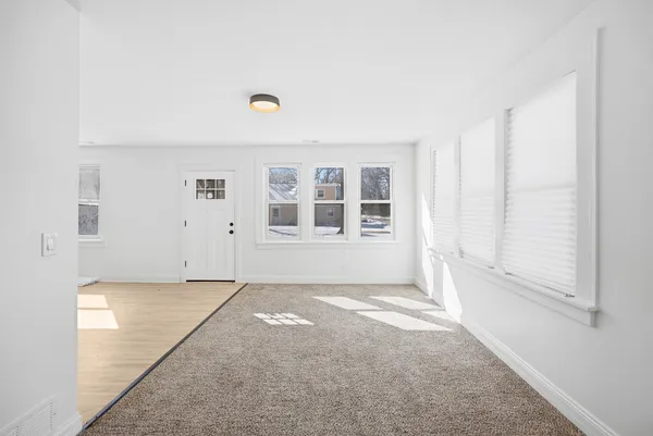 an empty room with windows