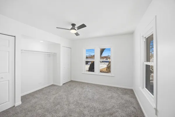 a view of empty room with windows