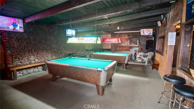 a room with table and chairs