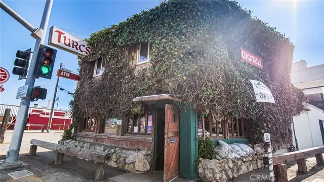 a front view of a building with an outdoor space