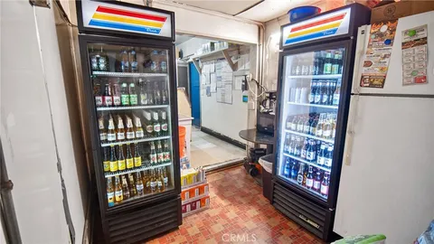 a view of water heater room with furniture and book shelf
