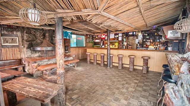 a view of a chairs and table in a patio