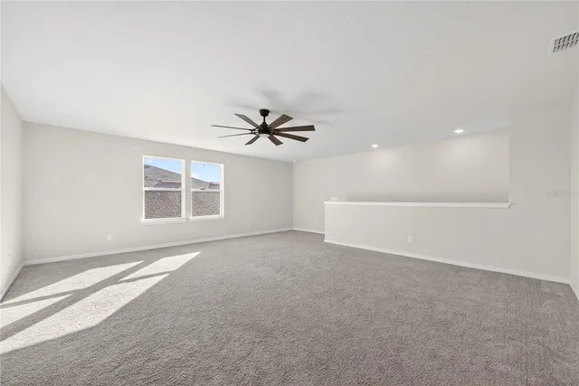 a bathroom with double sink and a mirror