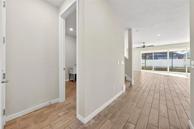 an aerial view of a house with a ocean view