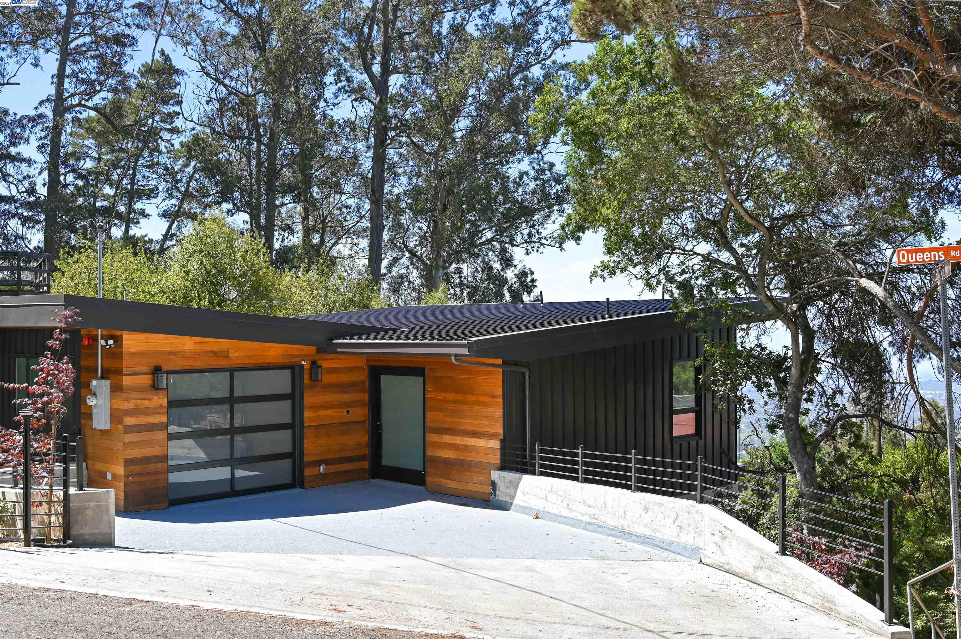 1298 Queens Road Berkeley, CA 94708 - Photo 1 of 1 a front view of a house with garage