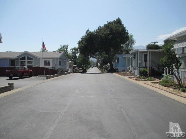 1225-5 South Rice Road, Unit 5 Ojai, CA 93023 - Photo 41 of 41 a view of a street with a building in the background