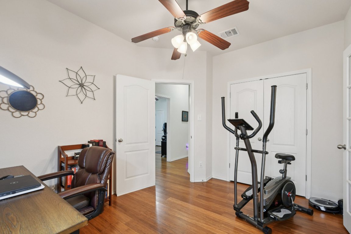 1028 Hot Spring Valley Buda, TX 78610 - Photo 25 of 39 a view of a room with gym equipment