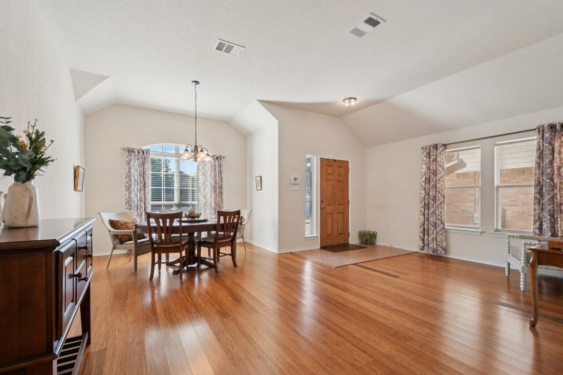 1028 Hot Spring Valley Buda, TX 78610 - Photo 8 of 39 a view of a livingroom with furniture window and wooden floor