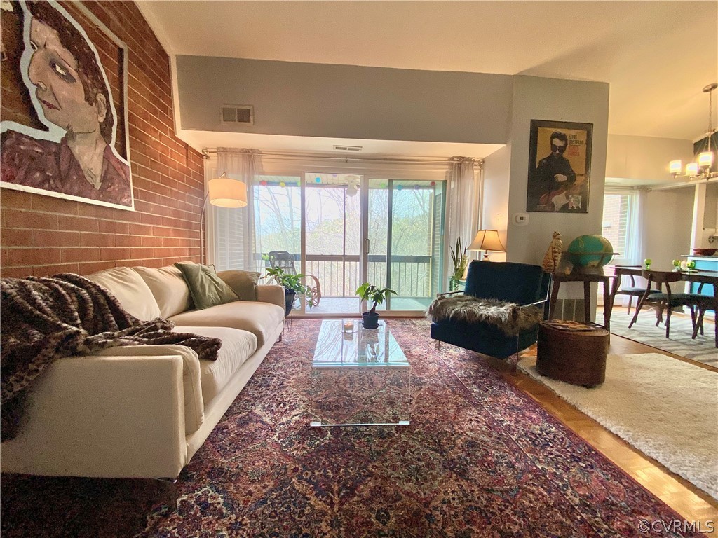5220 Castlewood Road, Unit F Richmond, VA 23234 - Photo 3 of 26 Exposed Brick, entrance onto balcony.