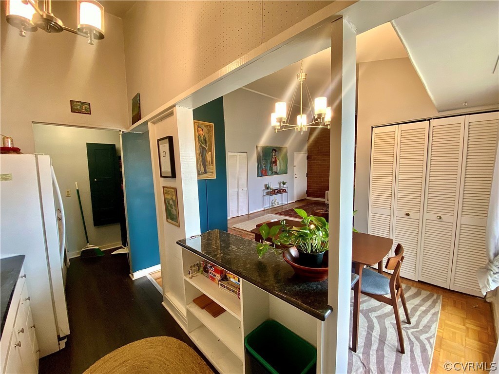 5220 Castlewood Road, Unit F Richmond, VA 23234 - Photo 7 of 26 View from Kitchen into Dining & Laundry.