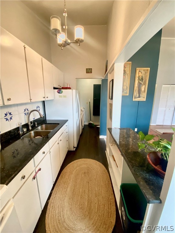 5220 Castlewood Road, Unit F Richmond, VA 23234 - Photo 8 of 26 Kitchen into Laundry& Storage room.