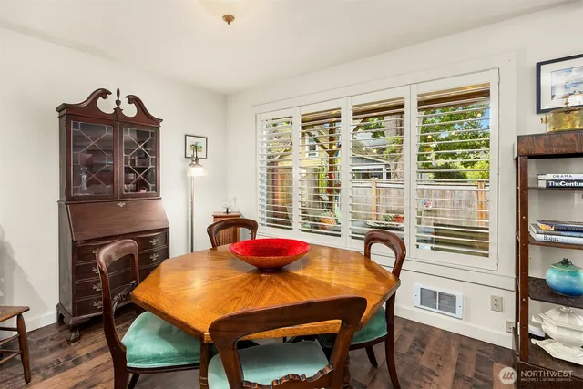 a bedroom with a bed and a table in it