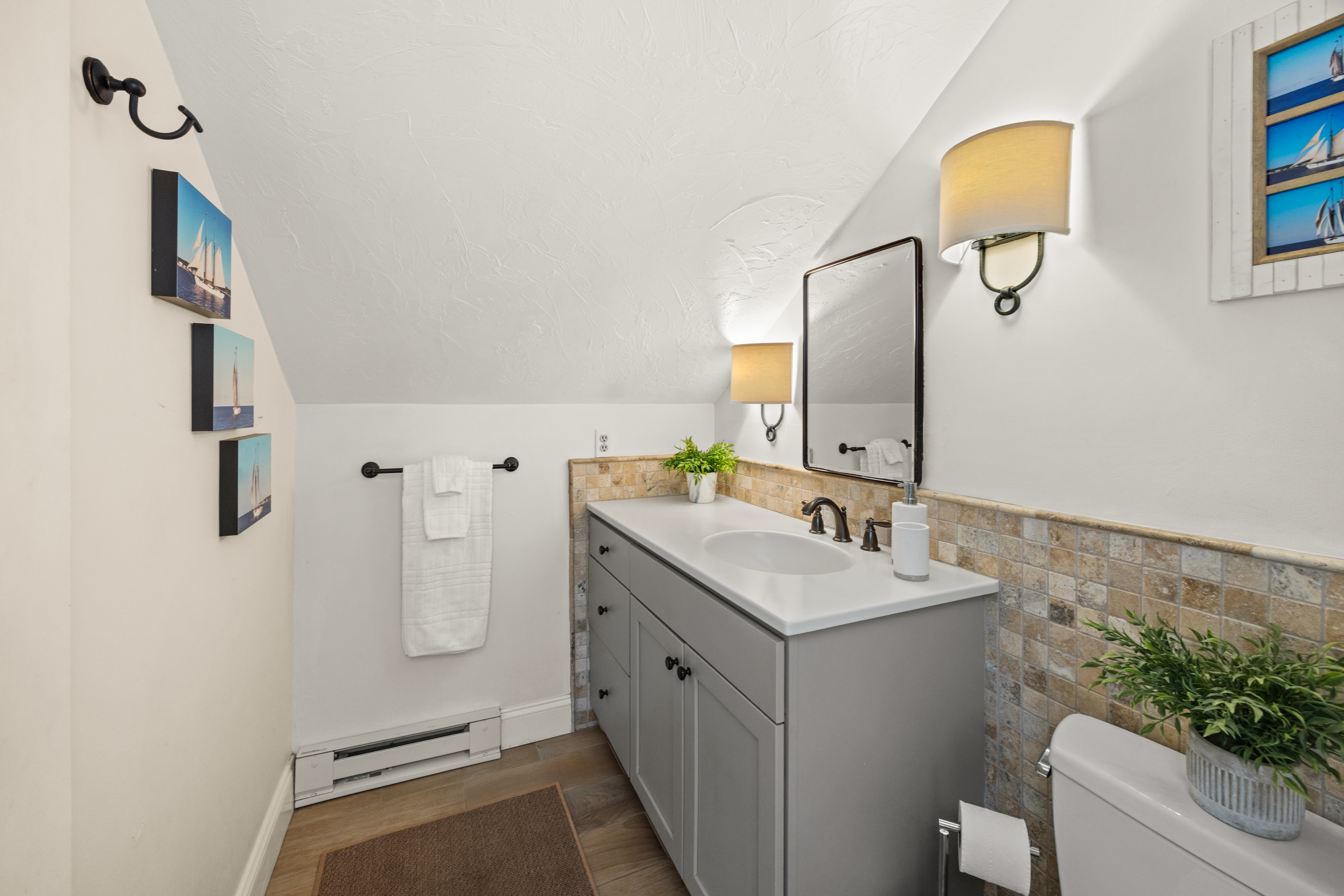 58 Rd To The Plaines Edgartown, MA 02539 - Photo 31 of 40 a bathroom with a sink and a mirror