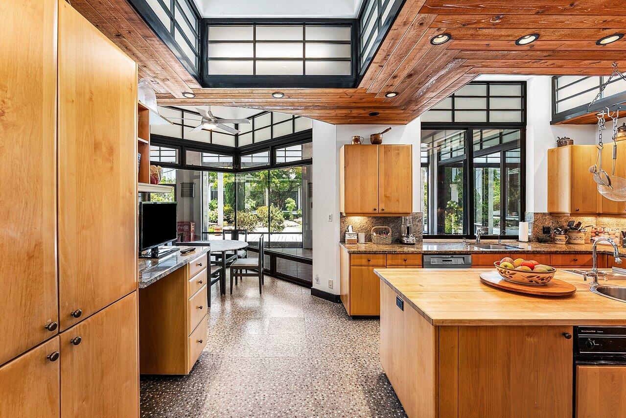 8549 Surrey Lane Boca Raton, FL 33496 - Photo 17 of 106 a kitchen with stove and cabinets