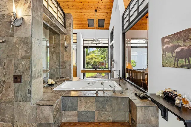 a view of a deck with a big yard