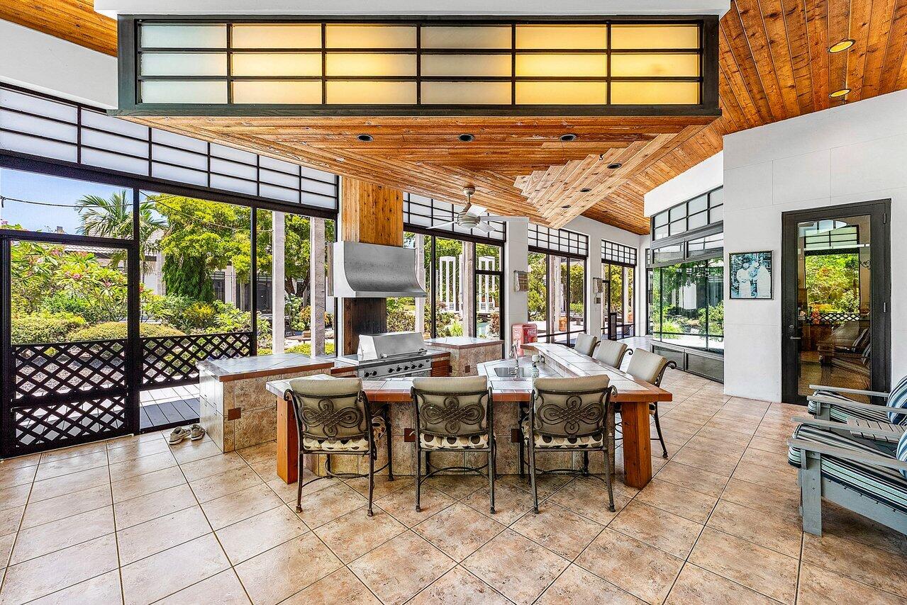 8549 Surrey Lane Boca Raton, FL 33496 - Photo 36 of 106 a outdoor space with lots of tables and chairs