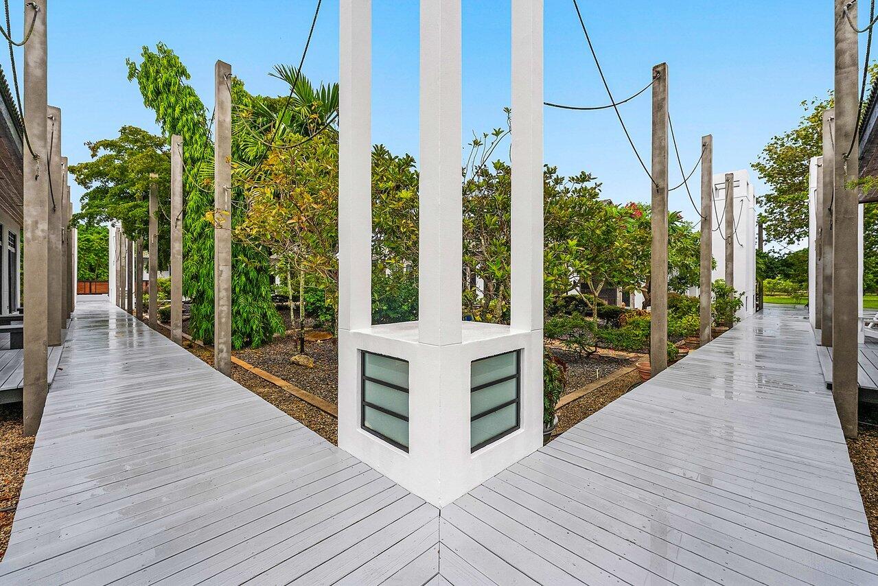 8549 Surrey Lane Boca Raton, FL 33496 - Photo 42 of 106 a view of a balcony with potted plants
