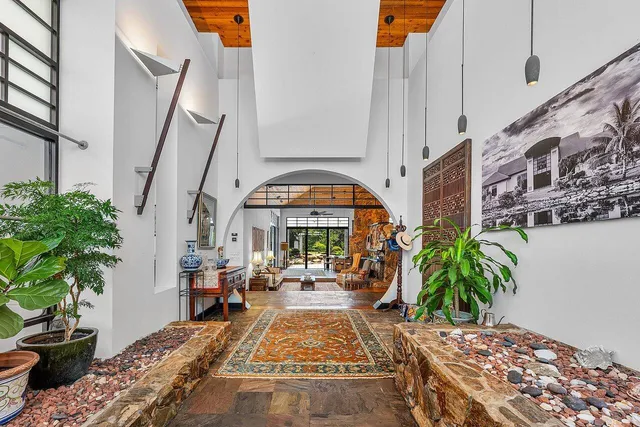 a kitchen with stove and cabinets