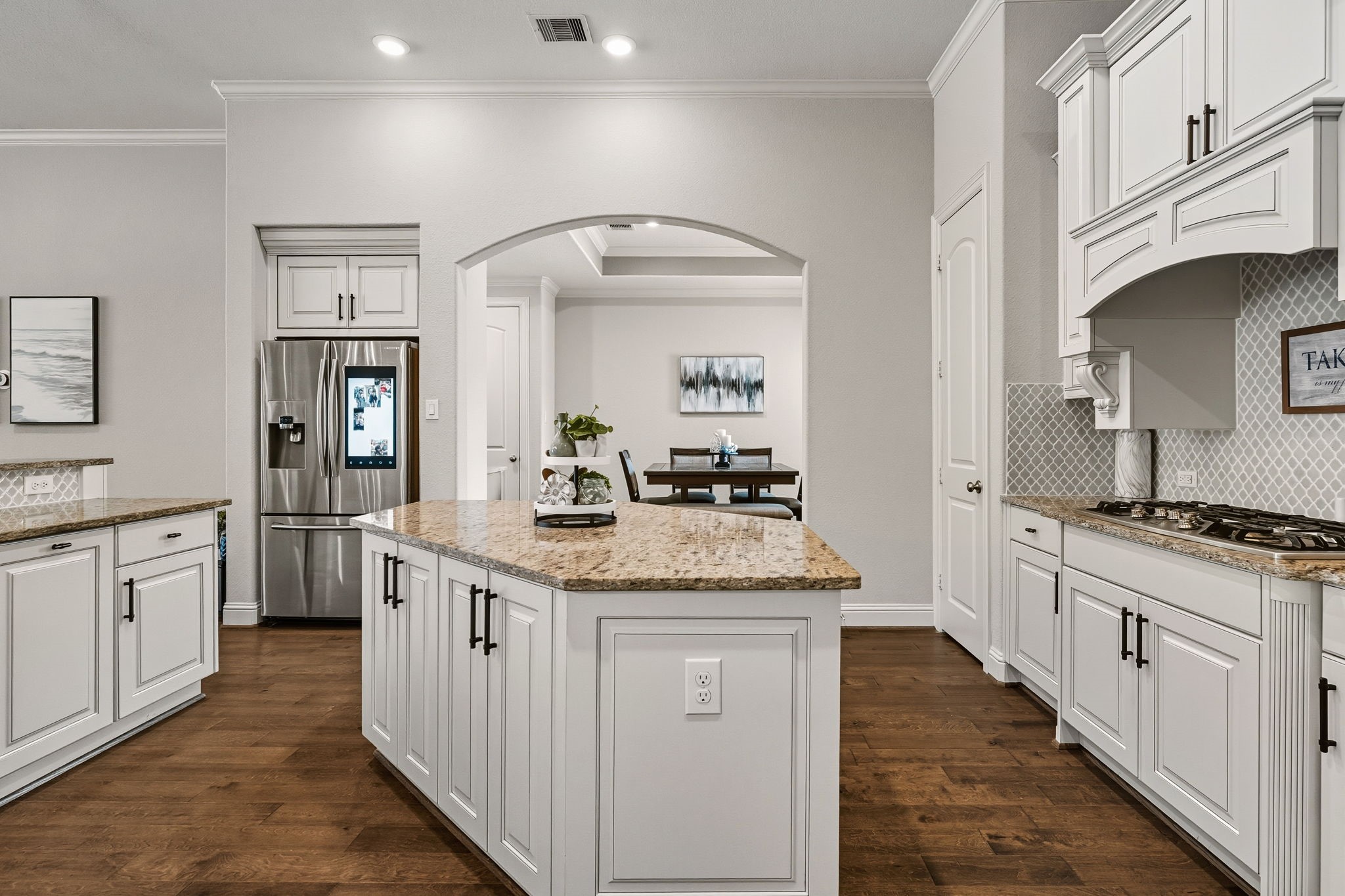 2008 Green Terrace Lane Pinehurst, TX 77362 - Photo 17 of 47 Alternate view of the kitchen and island. The breakfast area is next to the kitchen for easy access when having a family meal.
