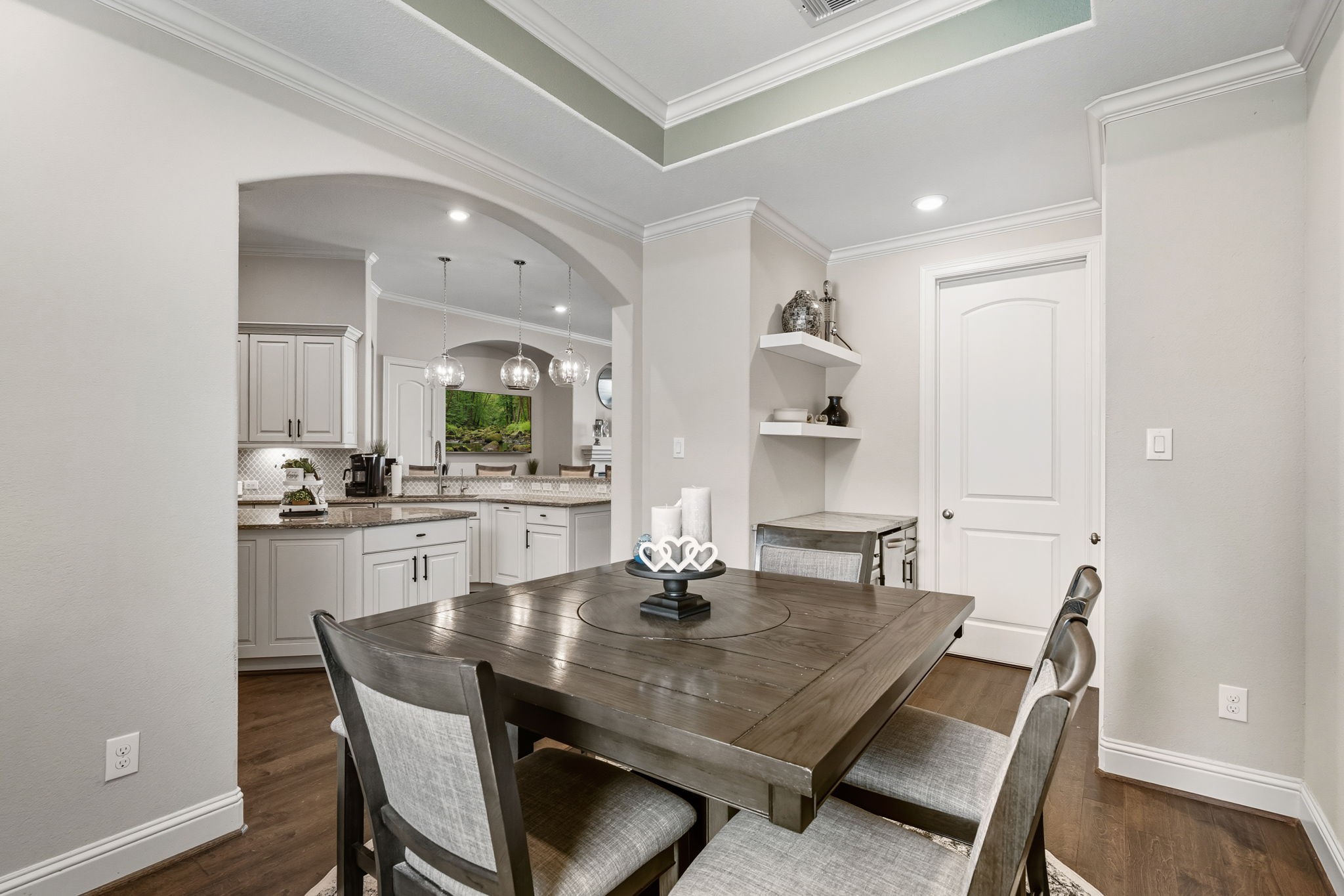 2008 Green Terrace Lane Pinehurst, TX 77362 - Photo 18 of 47 Breakfast nook is close to kitchen and has a dry bar and built-in icemaker. Laundry room and garage door allow for quick access.