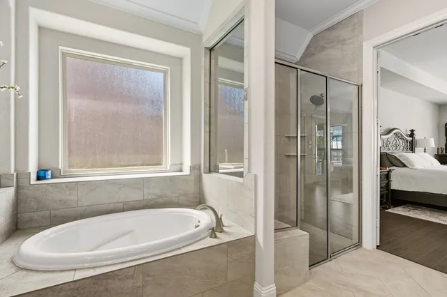 a view of a house with swimming pool and sitting area