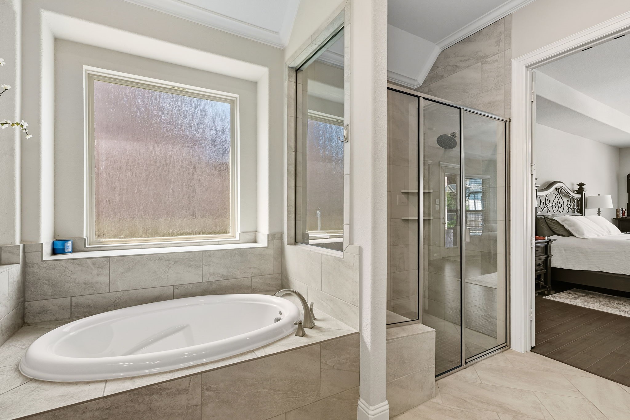 2008 Green Terrace Lane Pinehurst, TX 77362 - Photo 23 of 47 The large garden tub is perfect for you to soak away the stress of the day. There is a large walk-in shower, high ceilings with crown molding and lots of natural light.