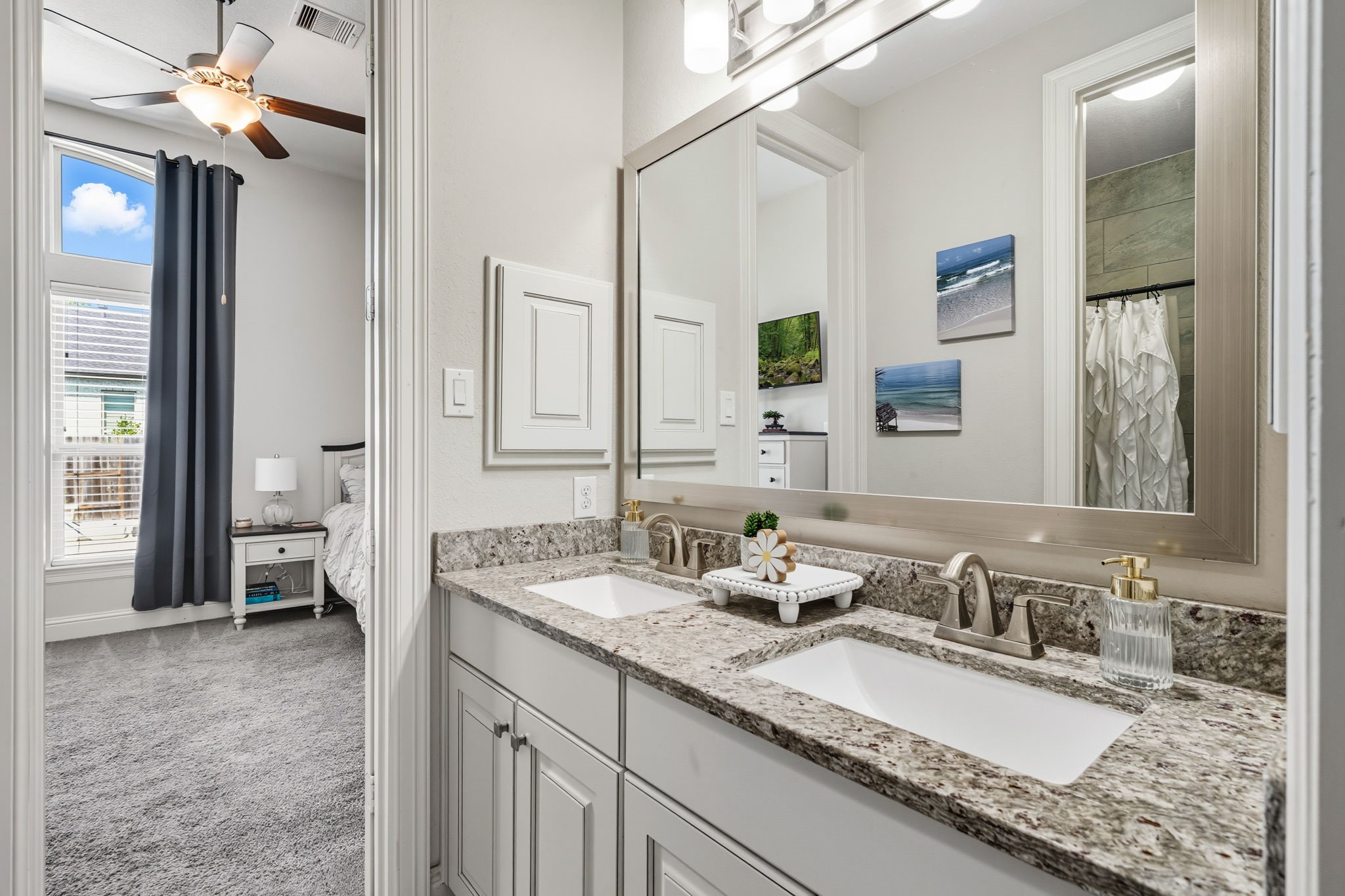2008 Green Terrace Lane Pinehurst, TX 77362 - Photo 25 of 47 Jack and Jill bathroom between the two bedrooms on the first floor offer two sinks and a separate bathroom area for privacy.