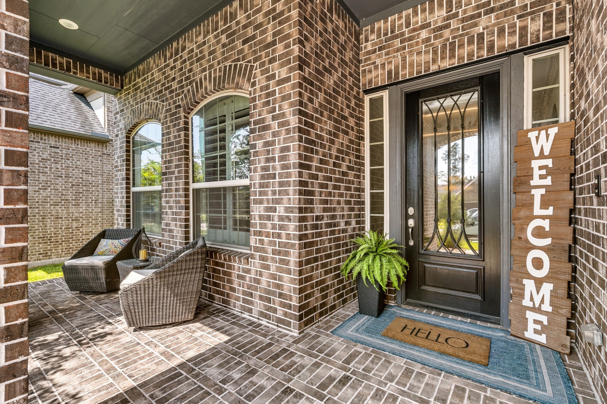 2008 Green Terrace Lane Pinehurst, TX 77362 - Photo 3 of 47 The sign says it all. Welcome Home. The brick front porch is the perfect place to sit and have a glass of iced tea in the afternoon.