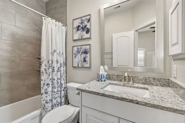 a view of a backyard with sitting area